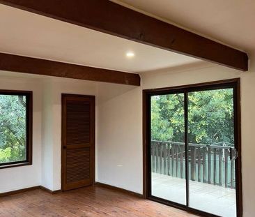 Spacious 4-Bedroom Home in Prime West Wollongong Location - Photo 2
