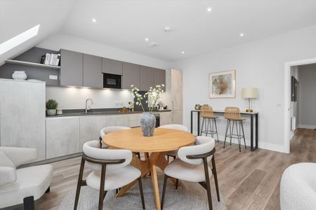 **SOLE AGENT** Newly built 2-bed first-floor flat with open-plan living, lift access, video entry, EV parking, all just steps from Esher High Street & train station. - Photo 3