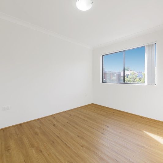 2 bedroom unit with natural light, located in a great location - Photo 1
