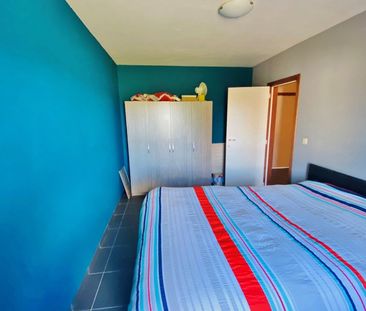 Woning met 3 slaapkamers, garage en tuin - Photo 4