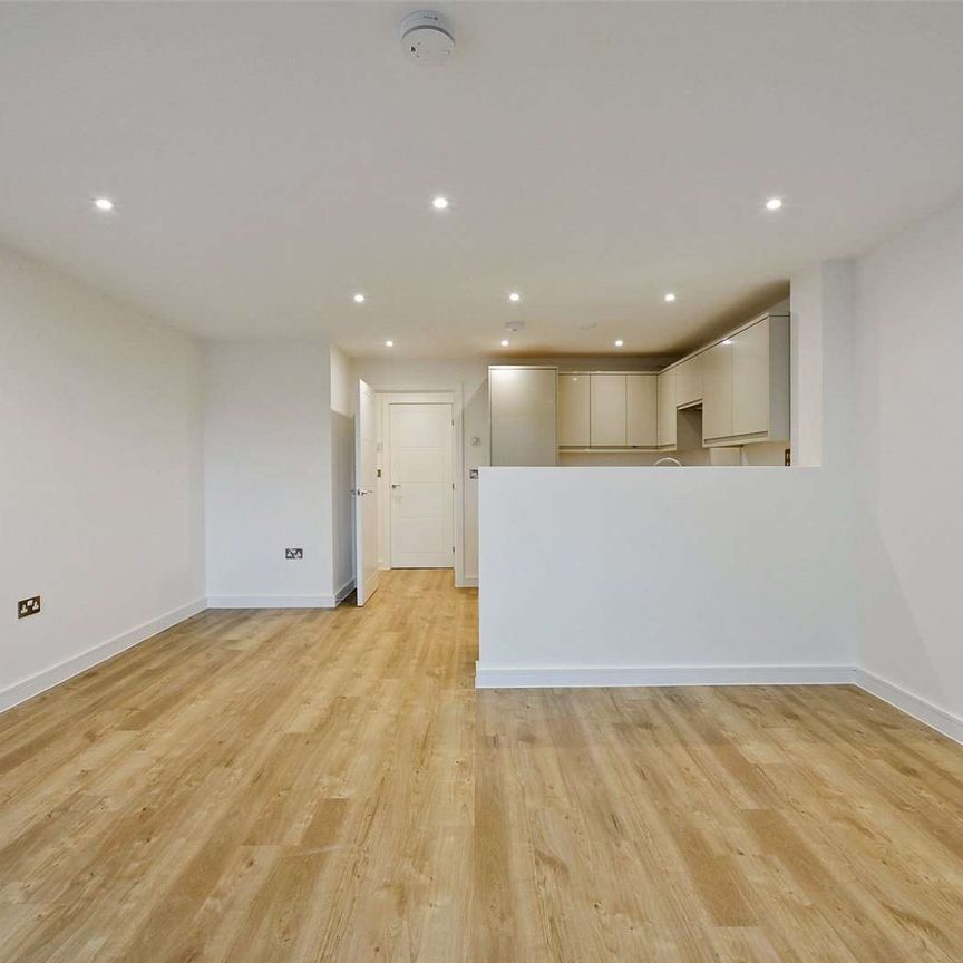 A brand new one bed apartment with one parking space offering light, modern interiors in a sought after location. - Photo 1