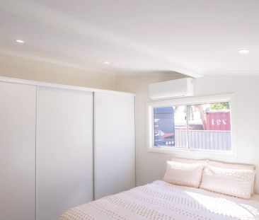 Modern Family Home with Space, Style & Comfort - Photo 1