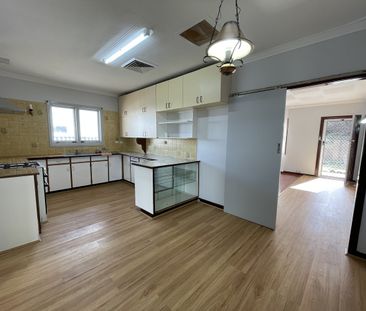 Freshly Updated Home with Spacious Living and Ideal Location! - Photo 2