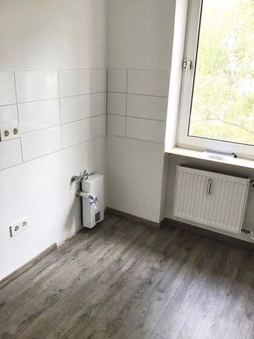 Neues Zuhause für Sie! Renovierte 3-Zimmer-Wohnung in zentraler Lage - Photo 4