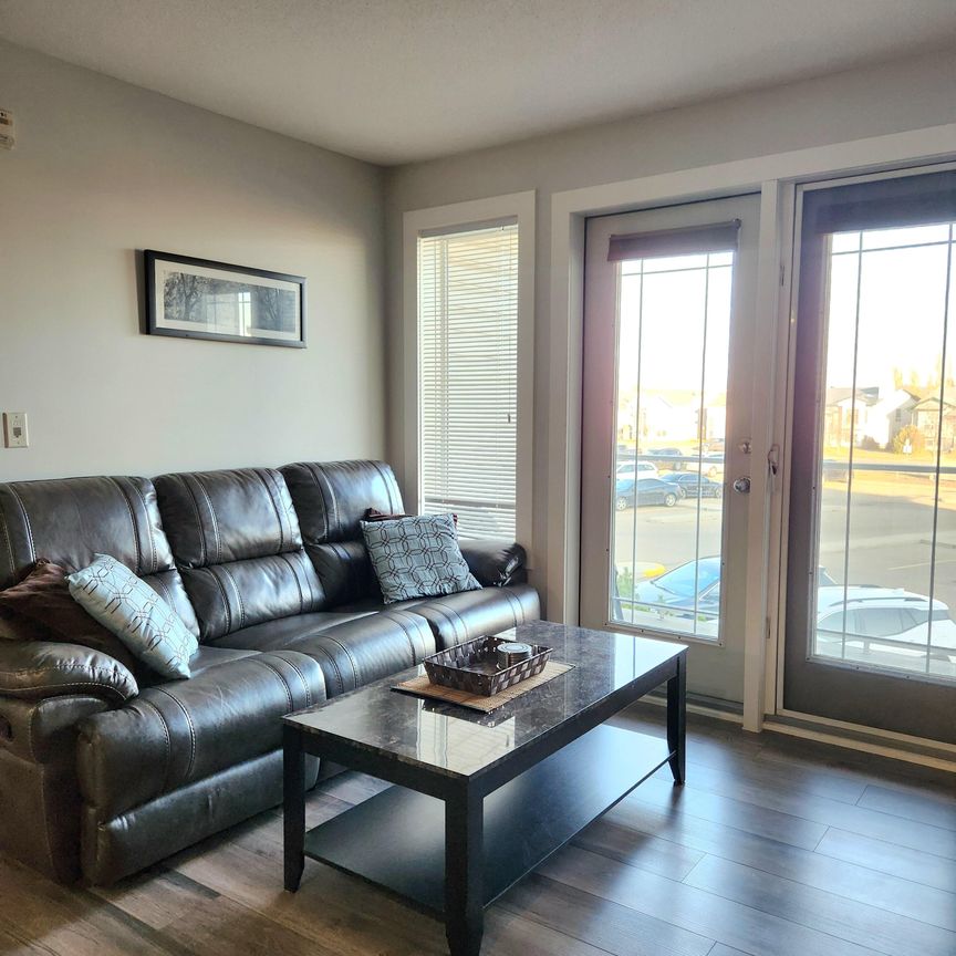 Fully Furnished 1 Bedroom + Den | All-Inclusive Living - Photo 1