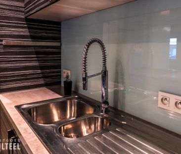 Modern appartement met 1 slaapkamer, terras en garage. - Photo 1