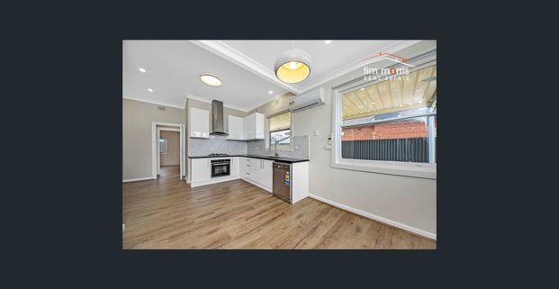 Newly Updated Low Maintenance Light-Filled Home - Photo 1