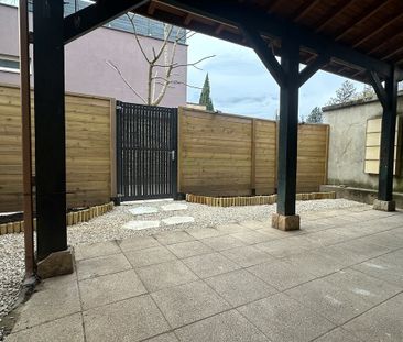 Appartement T2 rénové de 61m2 en rez de jardin - Photo 1