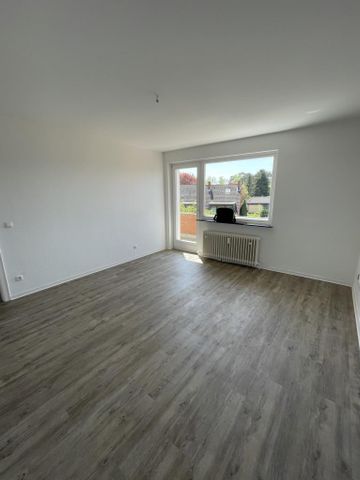 Gemütliche 3-Zimmer-Erdgeschosswohnung in Hambühren mit modernem Bodenbelag! - Photo 4