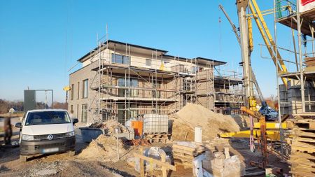 Hochwertige Neubauwohnung im 1. Obergeschoss mit Südbalkon! - Foto 2