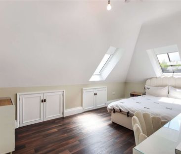 An immaculately curated village home set in gardens with a pool and... - Photo 4