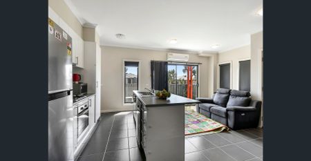 Comfortable Townhouse in a Convenient Location! - Photo 2