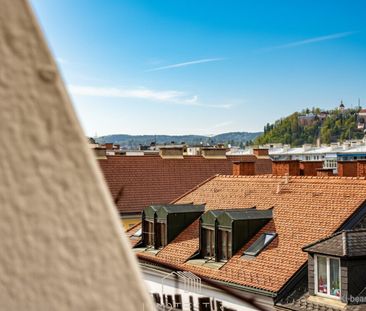 Über den Dächern der Stadt: Modernisierte 1,5-Zimmer-Wohnung mit Sc... - Photo 5