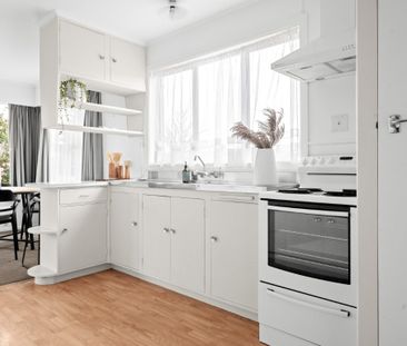 Step inside this three-bedroom home, where comfort meets convenience. - Photo 6