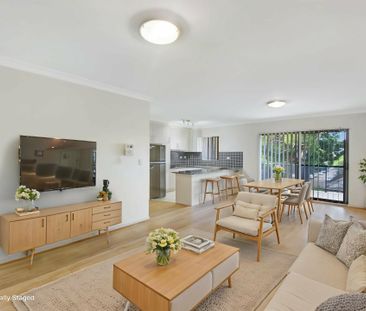 Perfectly Located 2 Bedroom Apartment! - Photo 1