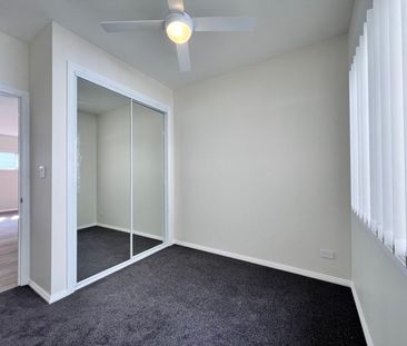 Fully Renovated Family Home with Air Conditioning - Photo 4