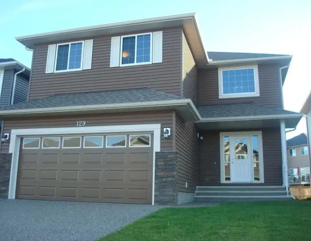 NEW EXECUTIVE HOUSE IN SW - 04BD RMs/Bonus RM Available Immediately! | 129 Everhollow Rise Southwest, Calgary - Photo 1