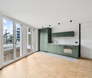 Attraktive und charmante Neubauwohnung mit Sitzplatz an bester Lage - Foto 2