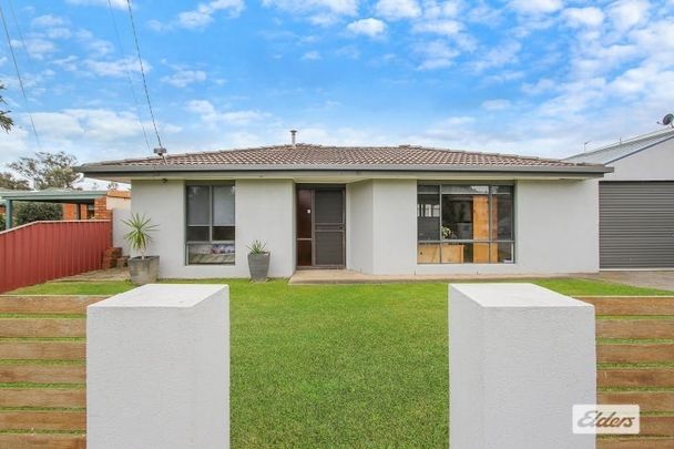 3-Bedroom Retreat With Extra Storage - Photo 1