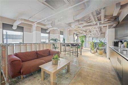 This contemporary two bedroom apartment with roof terrace is located within Wallbrook Gardens, a beautiful development benefitting from exceptional on-site amenities, communal gardens and only a 6-minute walk to Canning Town Station. - Photo 4