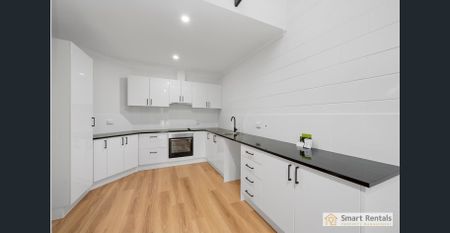 Freshly Renovated Unit in Belgian Gardens! - Photo 4