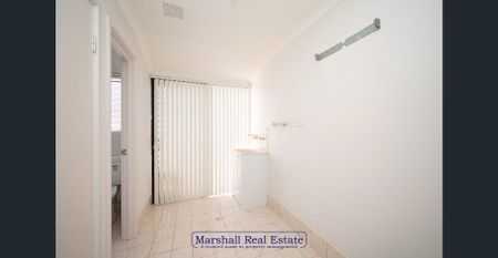 Air-Conditioned Family Home -6 Month Lease - Photo 4