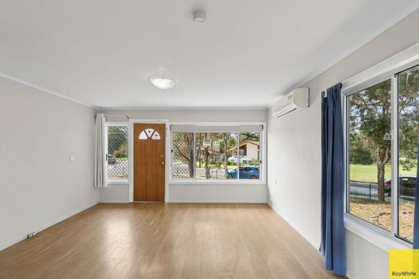 Versatile Family Living in a Prime Location! - Photo 1