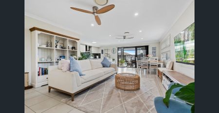 Stunning 4-Bedroom Family Home with Pool in Prime North Lakes Location! - Photo 2