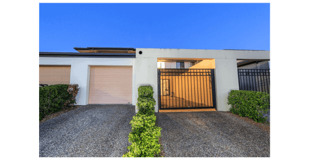 Step into luxury living with this stunning three-bedroom townhouse nestled in the heart of Upper Coomera's most desirable locale! - Photo 5