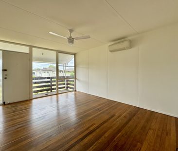 Updated Home with Spacious Yard and Prime Location - Photo 1