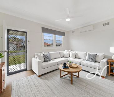 FRESHLY UPDATED HOME IN A CONVENIENT LOCATION - Photo 1