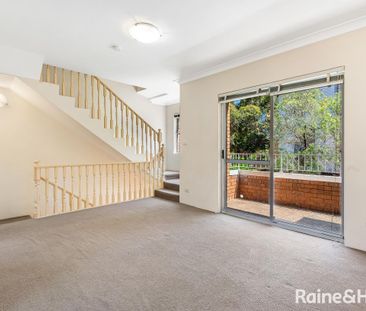 Spacious Two-Bedroom Townhouse in a Convenient Location - Photo 1