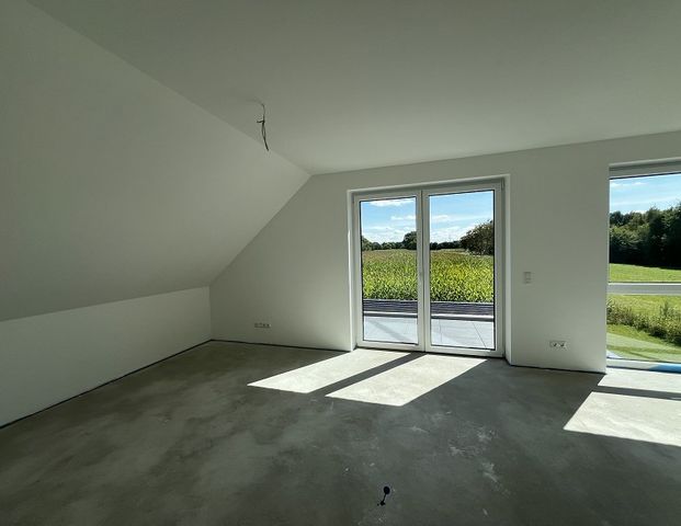 Vermietung: Erstbezug, moderne Obergeschosswohnung mit Balkon und Carport in Westoverledingen - Foto 1