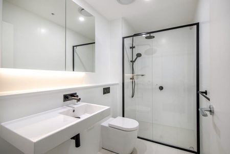 Sleek & Secure Apartment Close to Everything - Photo 4