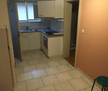 affordable and partly renovated 3.5-story duplex apartment in a cen... - Photo 2