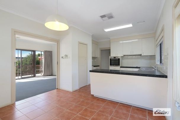 Spacious Two-Story Home with Versatile Layout! - Photo 1