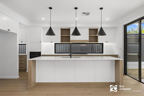 AVAILABLE NOW - BRAND NEW EXQUISITE EXECUTIVE RESIDENCE - LUXURIOUS LIVING WITH CITY VIEWS + POOL + SOLAR - Photo 1