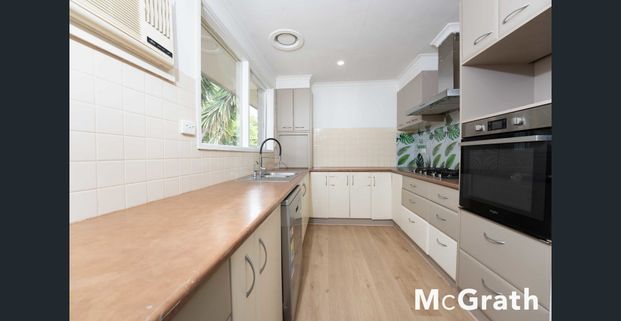 A Family-Friendly Home in a Prime Location - Photo 1