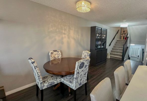 Stylish Auburn Bay Duplex With Garage & Newly Finished Basement - Photo 1