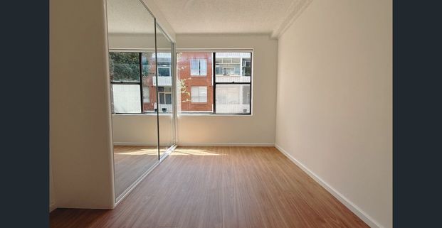REFRESHED 1 BEDDER - Photo 1