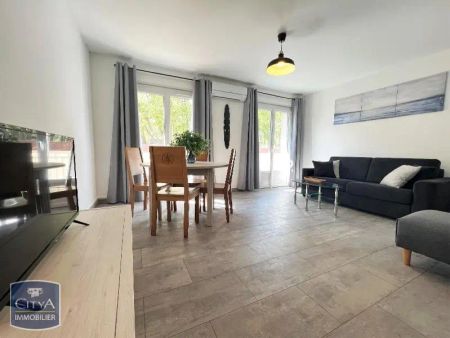Appartement à louer 3 pièces 63.05m² - Photo 2