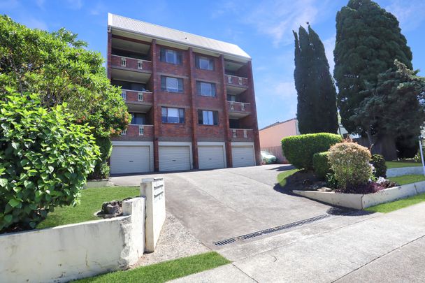 Modern Comfort in a Convenient Coastal Setting - Photo 1