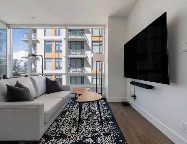 Beautiful spacious furnished corner unit | 703 - 1783 Manitoba St, Vancouver - Photo 1