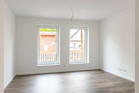 Saterland: Helle 2-Zimmer-Neubauwohnung im Erdgeschoss – Terrasse & moderne Haustechnik. Obj. 8942 - Photo 2
