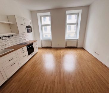 Charmante 2-Zi-Wohnung in 1100 Wien, U-Bahn-Nähe, mit Einbauküche u... - Photo 3