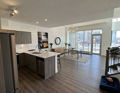 ONE YEAR FREE PARKING: Three Bedroom Townhouse in the Heart of Downtown Calgary | 850 11 St SW, Calgary - Photo 1