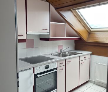 Charmant appartement de 2 pièces avec cachet sous les combles - Photo 1