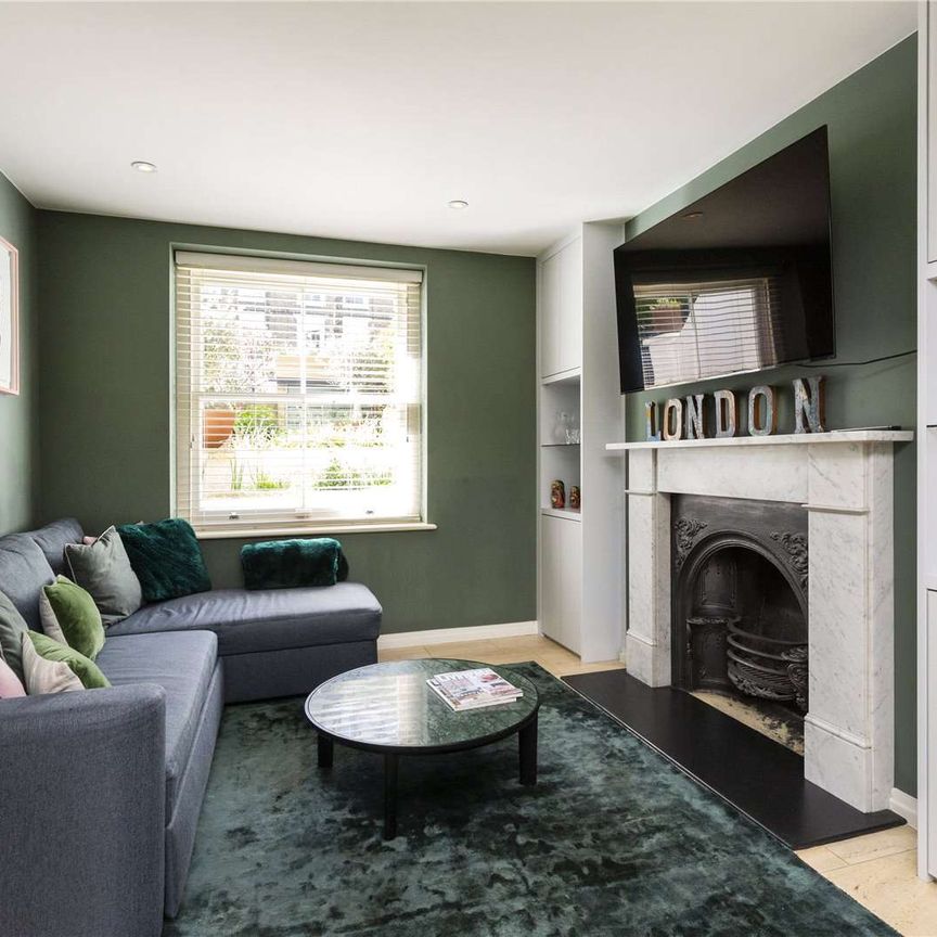 Stunning three bedroom terraced house refurbished to an excellent standard throughout. - Photo 1