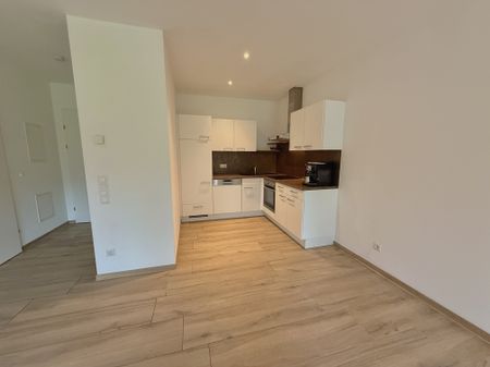 Ideale 2-Zimmer Gartenwohnung mit Tiefgarage und Parkplatz - Photo 3