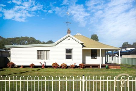 Spacious 4 Bedroom Home + Sleepout Located in Canley Vale! - Photo 2